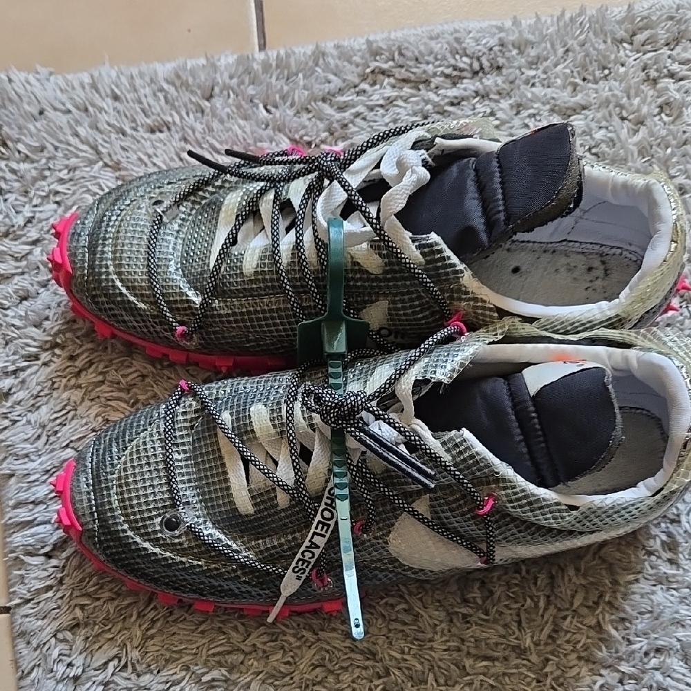 I'm Selling These Stylish Grey  and Pink Nike Off White Sneakers.